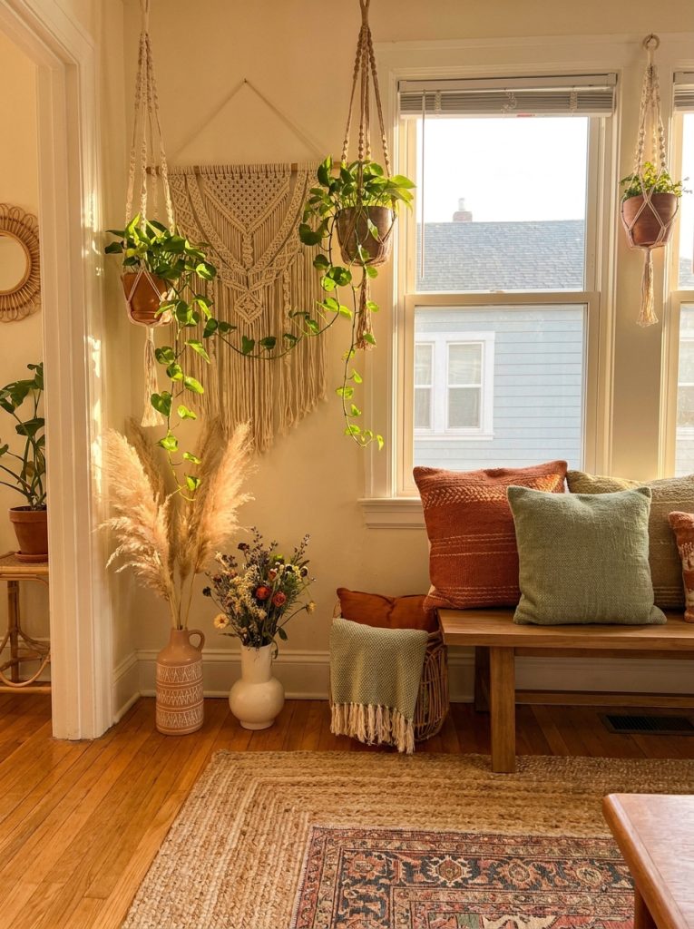 Boho home aesthetic DIY macrame wall hanging rope plant hangers trailing pothos dried pampas grass wildflowers thrifted vases jute rug woven cushions