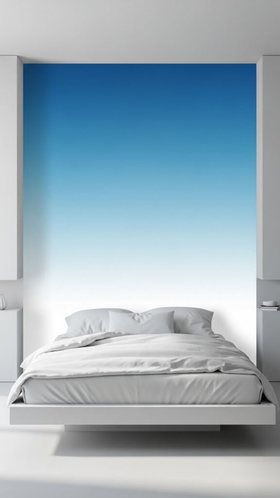 Ice blue ombre gradient accent wall fading to white in minimalist bedroom