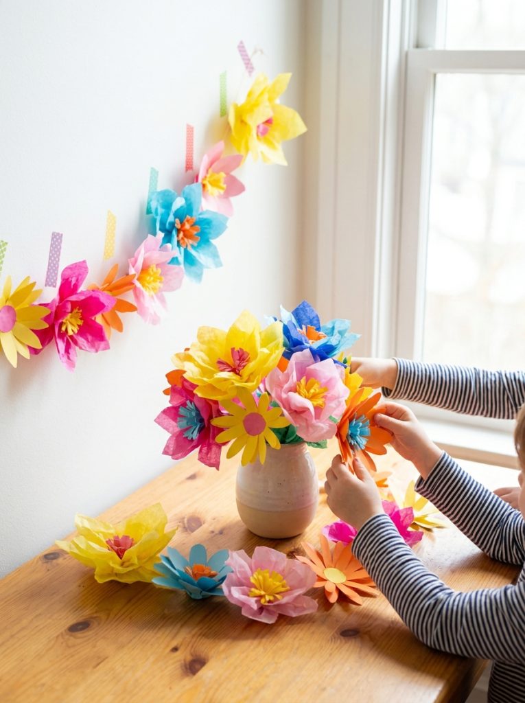 Fun colorful paper summer flower crafts with tissue and colored paper flowers in bright summer colors in vase display