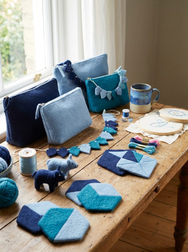 Beautiful blue aesthetic felt craft creations with navy powder blue and teal felt pieces in coordinating tones as decorations 