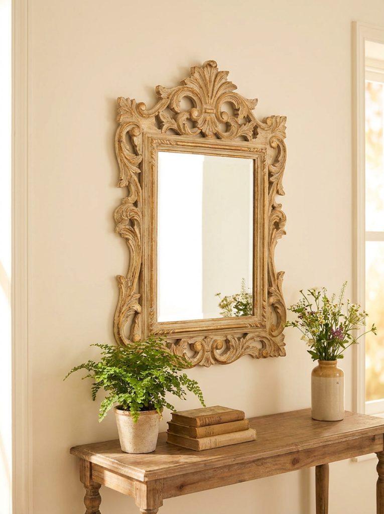  DIY vintage ornate mirror frame with carved details painted antique gold and cream around rectangular mirror