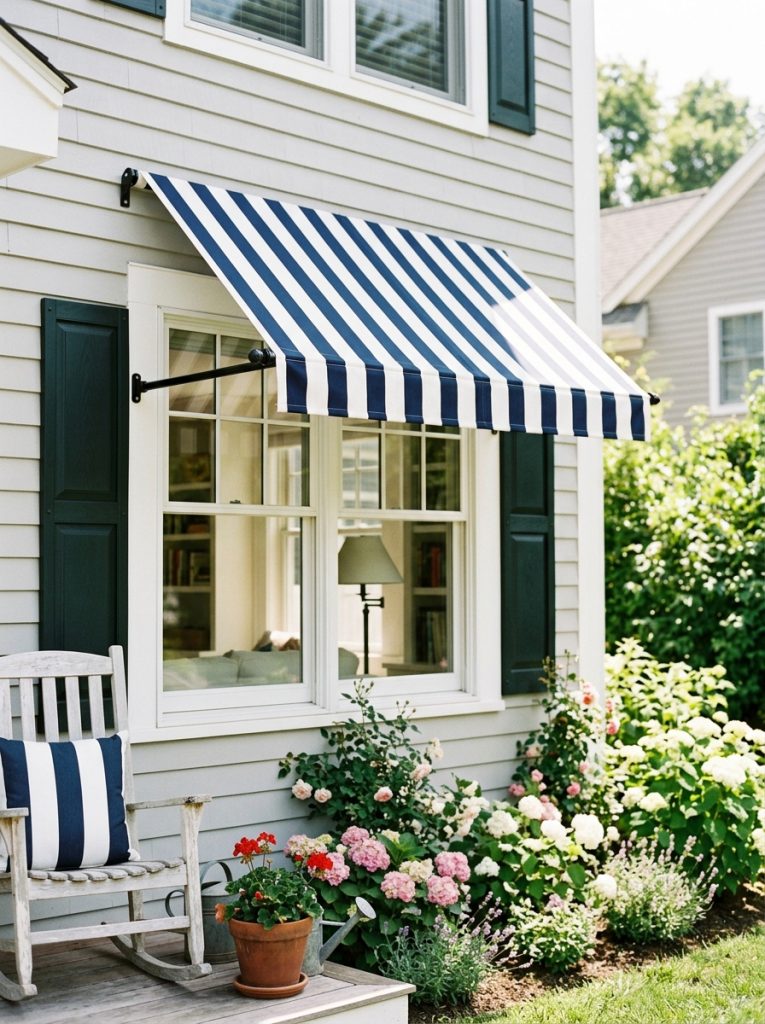 Beautiful striped fabric canvas window awning DIY in navy white or red white stripes above window on bright charming home exterior